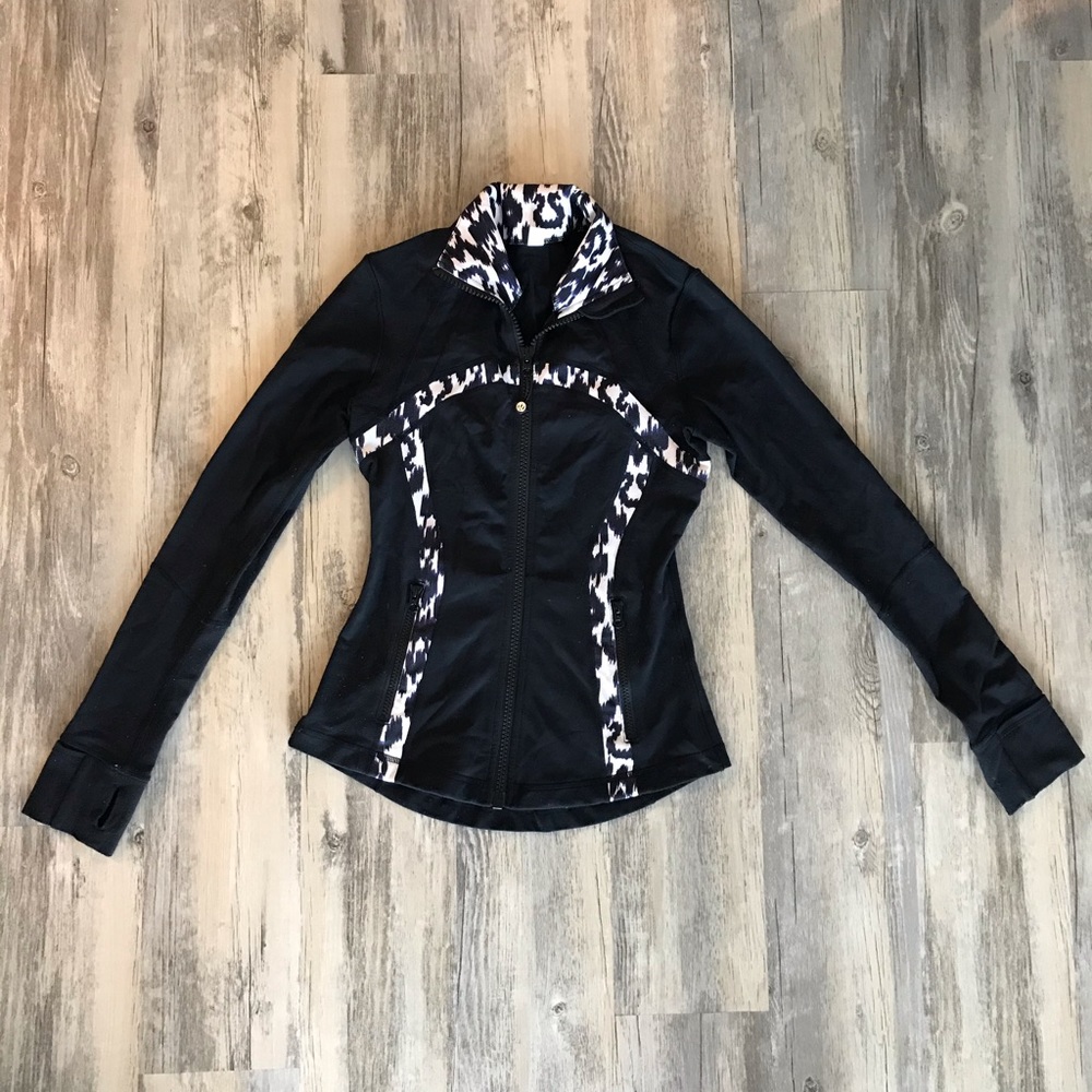 Black lululemon jacket with purple leopard trim